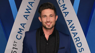 WATCH NOW: Michael Ray’s puppy made his Disney dreams come true — and helped thousands of other dogs, too