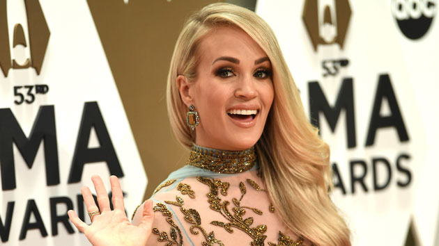 Carrie Underwood sends fans “some love” with a makeup free workout photo